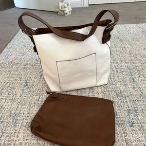 JOY purse perfect condition. Never used. Comes with small brown pouch.